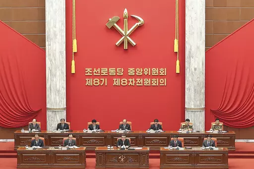 In this photo provided by the North Korean government, North Korean leader Kim Jong Un, bottom center on stage, attends an enlarged plenary meeting of the ruling Workers’ Party’s Central Committee at the party's headquarters in Pyongyang, North Korea, Friday, June 16, 2023. Independent journalists were not given access to cover the event depicted in this image distributed by the North Korean government. The content of this image is as provided and cannot be independently verified. Korean lan