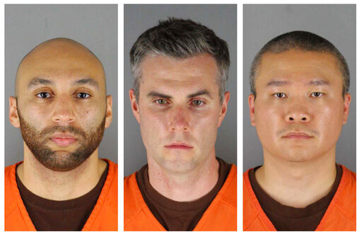 This combination of photos provided by the Hennepin County Sheriff's Office in Minnesota on June 3, 2020, shows, from left, former Minneapolis police officers J. Alexander Kueng, Thomas Lane and Tou Thao. The former policer officers are on trial in federal court accused of violating Floyd's civil rights as fellow Officer Derek Chauvin killed him. Judge Paul Magnuson abruptly recessed on Wednesday, Feb. 2, 2022 after one of the defendants tested positive for COVID-19. (Hennepin County Sheriff's O