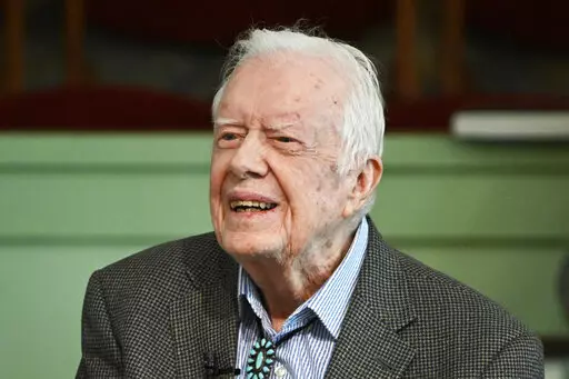 In this Nov. 3, 2019 file photo, former President Jimmy Carter teaches Sunday school at Maranatha Baptist Church in Plains, Ga. The Carter Center says Carter has entered home hospice care, Saturday, Feb. 18, 2023. The foundation created by the 98-year-old former president says that after a series of short hospital stays, Carter “decided to spend his remaining time at home with his family and receive hospice care instead of additional medical intervention." (AP Photo/John Amis, File)