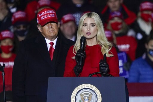 President Donald Trump watches as daughter Ivanka Trump speaks at a campaign event at the Kenosha Regional Airport, Nov. 2, 2020, in Kenosha, Wis. The House committee investigating the attack on the U.S. Capitol wants to know what Ivanka Trump heard and saw that day as they try to stitch together the narrative of the riots and Donald Trump's role in instigating them. (AP Photo/Morry Gash, File)