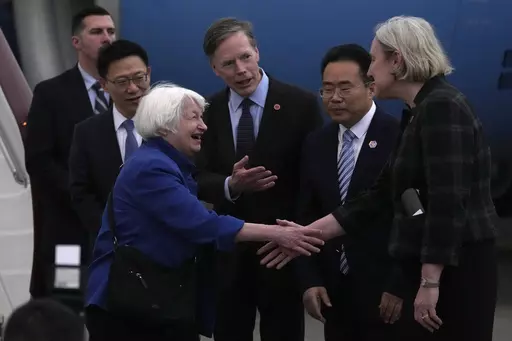 U.S. Treasury Secretary Janet Yellen, left, shakes hands with Lisa Heller, U.S. Consul for Guangzhou after arriving at Guangzhou Baiyun Airport in southern China's Guangdong province, Thursday, April 4, 2024. Treasury Secretary Janet Yellen is heading to a China that is determined to avoid open conflict with the United States. (AP Photo/Andy Wong, Pool)