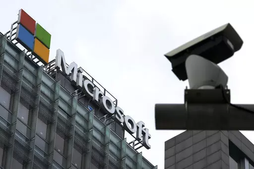 A security surveillance camera is seen near the Microsoft office building in Beijing, July 20, 2021. Microsoft says cyberattacks by state-backed Russian hackers have destroyed data across dozens of organizations in Ukraine and produced a “chaotic information environment.” The company said in a report released Wednesday, April 27, that Russia-aligned threat groups were preparing long before the Feb. 24 invasion. (AP Photo/Andy Wong, File)