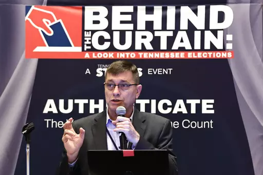 Clay Parikn talks about variables in security during an Election Conspiracy Forum Saturday, March 11, 2023, in Franklin, Tenn. (AP Photo/Wade Payne)