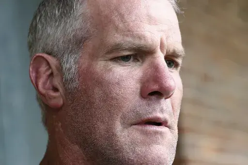 Retired NFL quarterback Brett Favre speaks to the media in Jackson, Miss., Oct. 17, 2018. (AP Photo/Rogelio V. Solis, File)