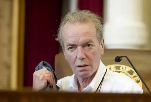 Author Martin Amis prepares to give a speech at the Texas Book Festival at the Capitol in Austin, Texas, on Saturday, Oct. 25, 2014. Amis, who brought a rock ‘n’ roll sensibility to his stories and lifestyle, has died. He was 73. His death, from cancer of the esophagus, was confirmed by his agent, Andrew Wylie, on Saturday, May 20, 2023. (Jay Janner/Austin American-Statesman via AP, File)