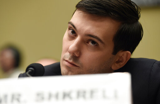 Former Turing Pharmaceuticals CEO Martin Shkreli attends the House Committee on Oversight and Reform Committee hearing on Capitol Hill in Washington, Feb. 4, 2016. A federal judge on Friday, Jan. 14, 2022 ordered Shkreli to return $64.6 million in profits he and his company reaped from inflating the price of the life-saving drug Daraprim and barred him from participating in the pharmaceutical industry for the rest of his life. (AP Photo/Susan Walsh, File)