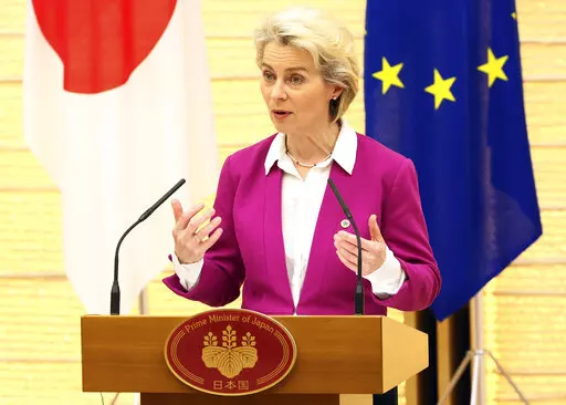 European Commission President Ursula von der Leyen announces a joint statement with Japanese Prime Minister Fumio Kishida and European Council President Charles Michel at the prime minister's official residence in Tokyo Thursday, May 12, 2022. (Yoshikazu Tsuno/Pool Photo via AP)