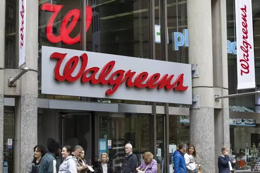 The entrance to a Walgreens is seen on Oct. 14, 2022, in Boston. Walgreens said Thursday, March 2, 2023, that it will not start selling mifepristone, an abortion pill, in 20 states that had warned of legal consequences if it did that. (AP Photo/Michael Dwyer, File)