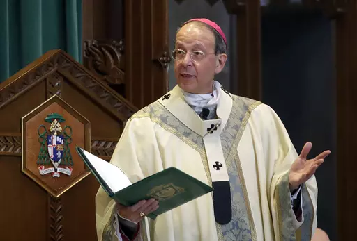 Baltimore Archbishop William Lori leads a funeral Mass in Baltimore on March 28, 2017. The Catholic Archdiocese of Baltimore announced Friday, Sept. 29, 2023, it filed for Chapter 11 reorganization days before a new state law goes into effect removing the statute of limitations on child sex abuse claims and allowing victims to sue their abusers decades after the fact. (AP Photo/Patrick Semansky, File)