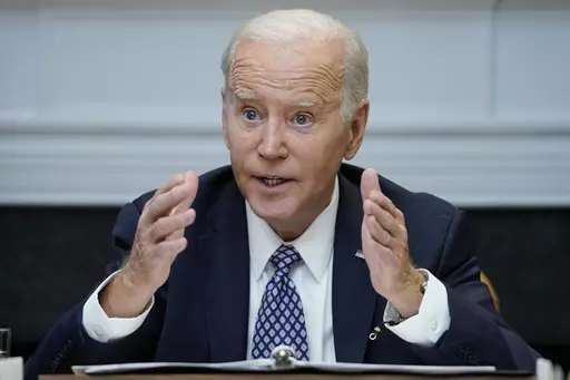 President Joe Biden speaks during a meeting with his "Investing in America Cabinet," in the Roosevelt Room of the White House, Friday, May 5, 2023, in Washington. Biden would veto a House GOP bill that aims to restrict asylum, build more border wall and cut a program that allows migrants a chance to stay in the U.S. lawfully for two years, an administration official said Monday, May 8. (AP Photo/Evan Vucci, File)