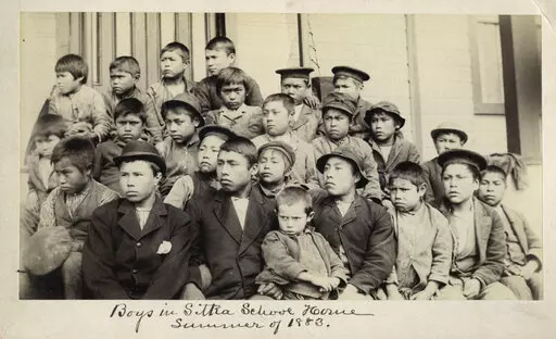 This photo made available by the Presbyterian Historical Society, Philadelphia shows students at a Presbyterian boarding school in Sitka, Alaska in the summer of 1883. U.S. Catholic and Protestant denominations operated more than 150 boarding schools between the 19th and 20th centuries. Native American and Alaskan Native children were regularly severed from their tribal families, customs, language and religion and brought to the schools in a push to assimilate and Christianize them. (Presbyteria